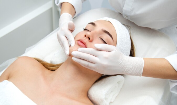 A woman getting a facial.